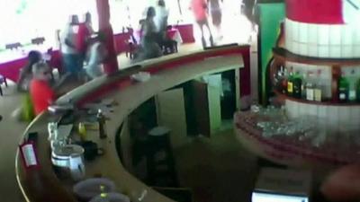 CCTV footage shows guests running from gunman in Ivory Coast attack