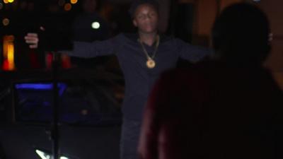 Still from a rap video