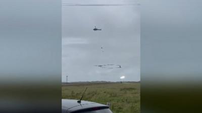 Helicopter strikes pylon