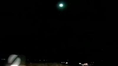 People across Britain reported seeing a large greenish light streak across the sky on Sunday evening.