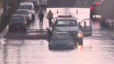 Flooded street in Costa Mesa