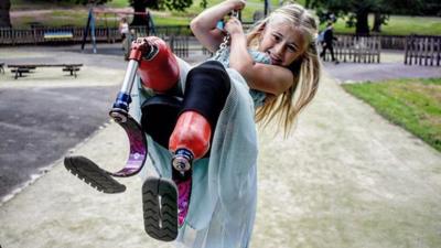 Daisy-May-on-a-swing.