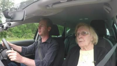 Laura Thomas and Greame Satchell in a car