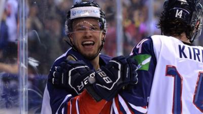 Ben Davies celebrates his winning goal in over-time against France at the 2019 IIHF Ice Hockey World Championship