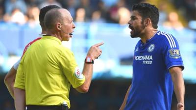 Referee Mike Dean and Chelsea's Diego Costa