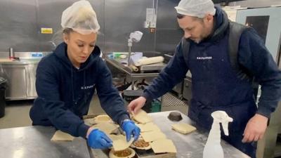 People baking in a bakery