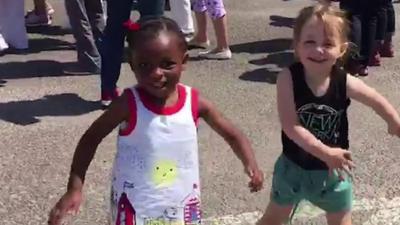 Children on the march through Cardiff in celebration of women winning the right to vote