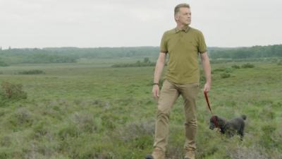 Chris Packham walks dog