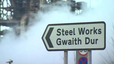 Steel works sign post