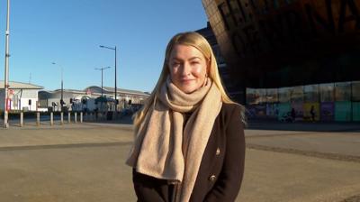 Imogen standing in from of the Millennium Centre