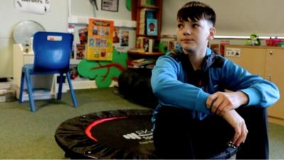 Boy on trampoline