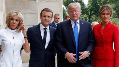 French President Emmanuel Macron (second left) poses next to his wife Brigitte Macron, US President Donald Trump and US First Lady Melania Trump outside the Army Museum during a ceremony at Les Invalides in Paris, France, 13 July 2017