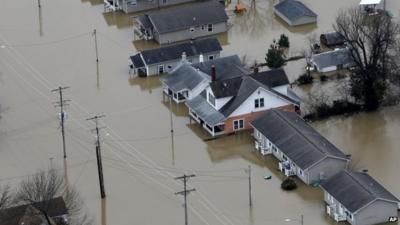 Houses surrounded by flood water