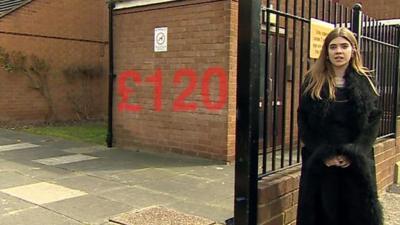 Vicky Spratt in front of a house