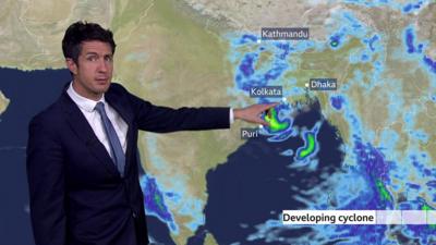 The forecast map shows storm in the Bay of Bengal