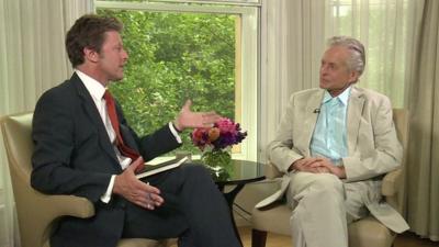 Michael Douglas talking to Charlie Stayt