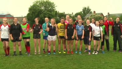 a girl's rugby training camp