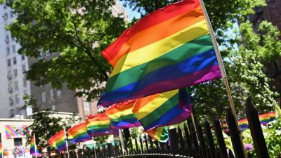 Rainbow flags outside Stonewall National Monument