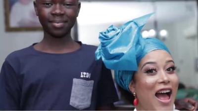 Young boy is gele expert