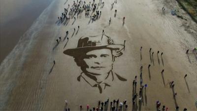 A sand portrait of suffragette Dr Elsie Maud Inglis