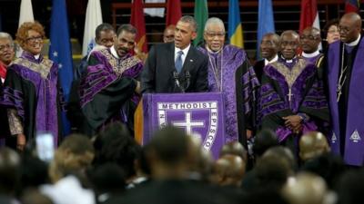 President Obama leads the congregation in singing Amazing Grace