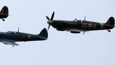 Spitfires and Hurricanes perform a fly past on August 18, 2015 in Biggin Hill, England