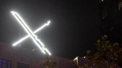 X sign on company's HQ