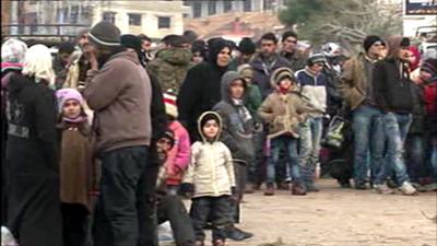 Syrians wait for aid to arrive