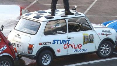 Alastair Moffat from Gloucester celebrates after he achieved the world's tightest parallel park in reverse, in Surrey, 12th November 2015