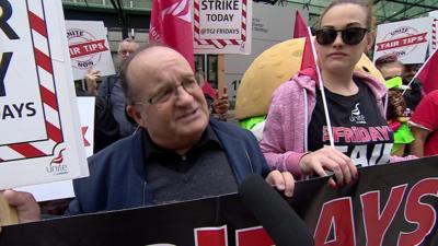 Striking TGI workers