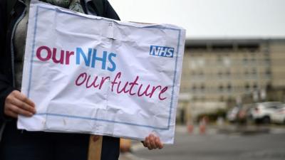 Sign saying 'Our NHS, our future'