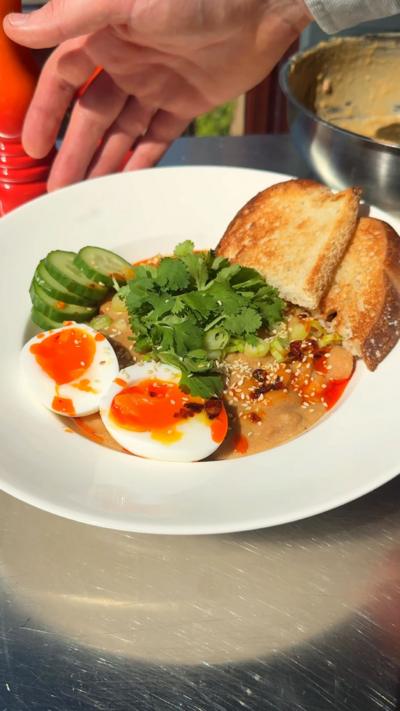 Chilli and sesame butter bean bowl served up in a white bowl