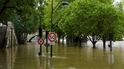 The River Seine in Paris has already burst its banks in several places