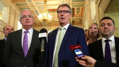 Ulster Unionist Party Leader Mike Nesbitt (centre) at Stormont