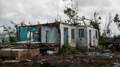 A badly damaged house in Barbuda