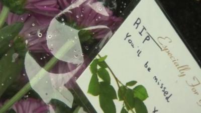 Close up of memorial note at scene of teenager's death in Bexleyheath