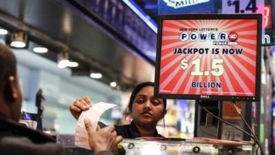 Man buying Powerball ticket