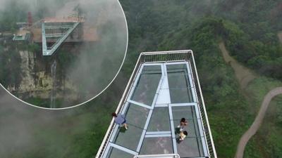 Would you be brave enough to take a stroll on a glass-bottomed walkway over a 120m-metre drop?! Take a look at this!