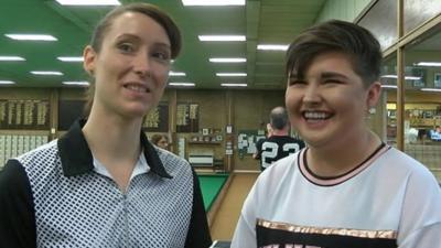 Two young international bowls players