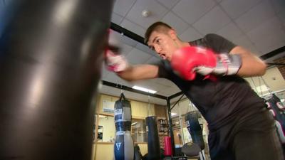 18-year-old John boxing