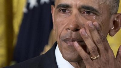 President Obama wipes away tears