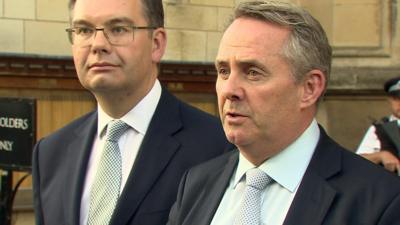 Liam Fox (right)