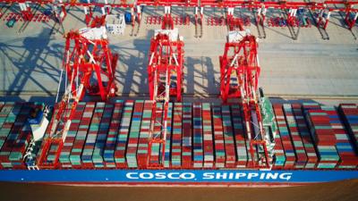 A loaded cargo ship at a wharf in Shanghai, China