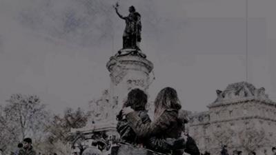 French people hug in the Place de la Republique, Paris, 16 November 2015