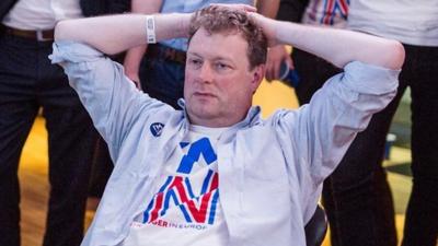 A supporter of the Stronger In campaign reacts after hearing results in the EU referendum