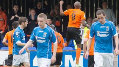 Miguel Chines celebrates scoring for Carrick Rangers