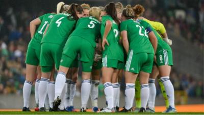 The Northern Ireland team in a pre-match huddle