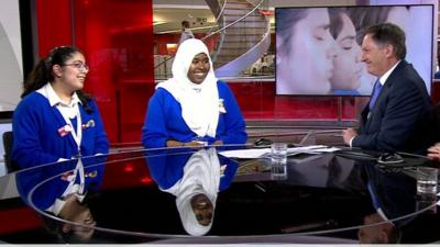 School children in a news studio