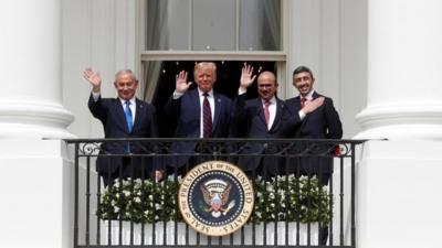 Israel, US, Bahrain and UAE leaders wave at the White House