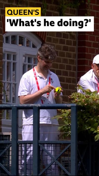 Man stitching up tennis ball at Queen's